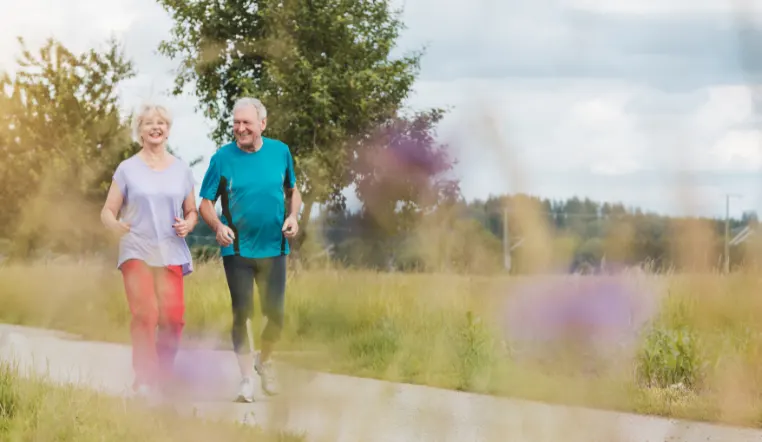 older couple going on a walk outside