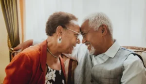 couple looking at each other smiling forehead to forehead