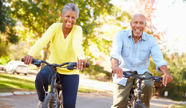 couple riding bikes outside