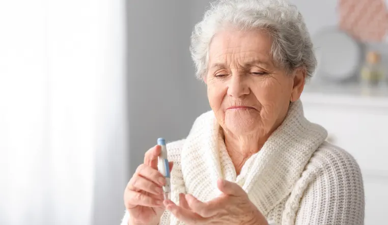 lady checking her sugar level