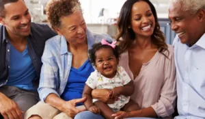 family smiling and laughing at each other