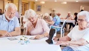 seniors playing bingo at a table