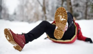 image of man falling on snow