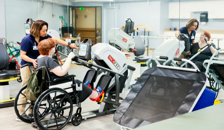 senior using medical equipment for rehab