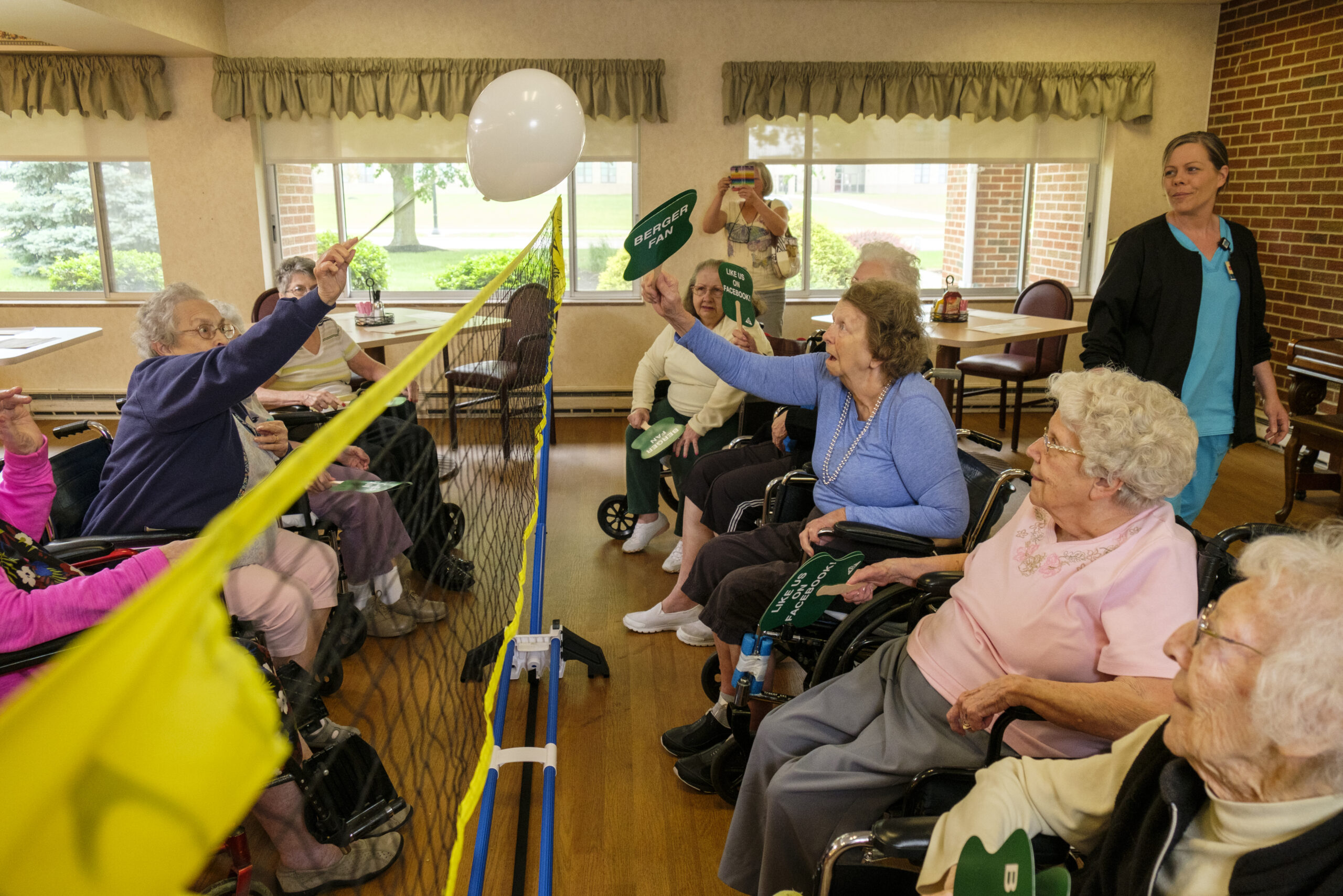 Seniors playing balloon volleyball