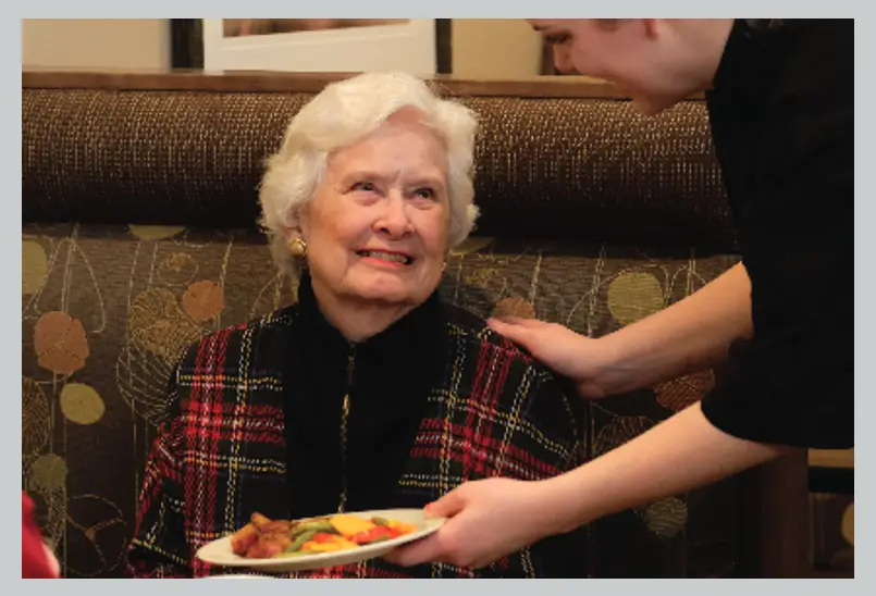 woman being served food