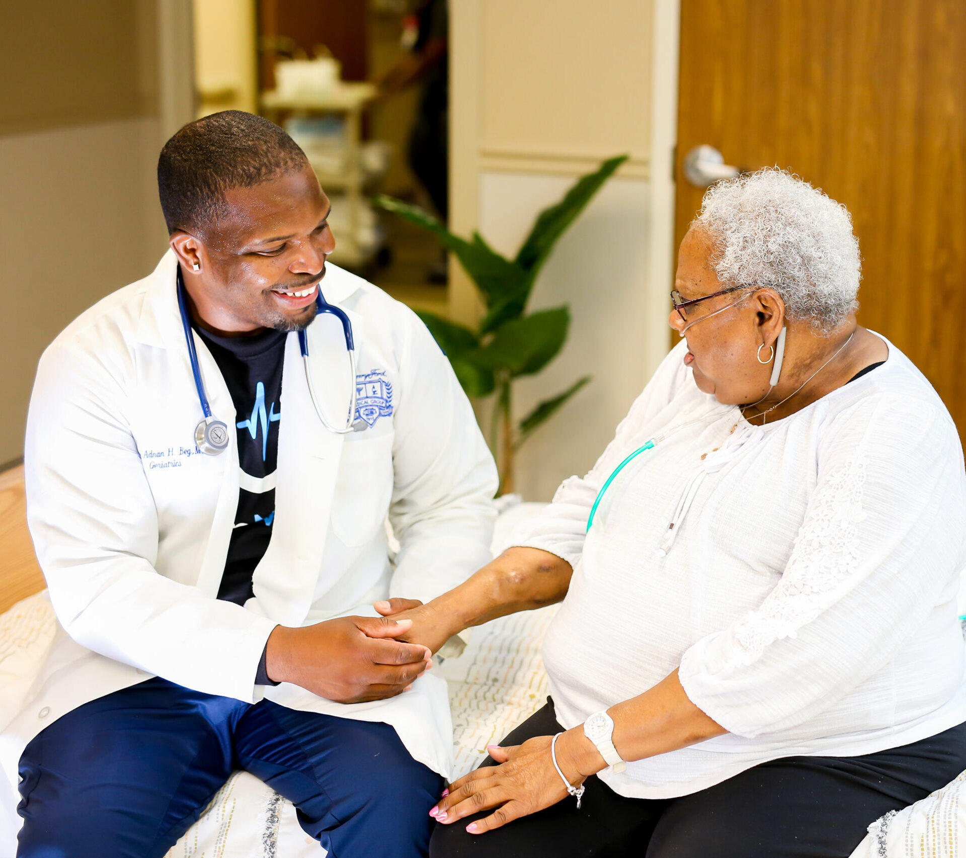 Lakelake resident sitting with nurse