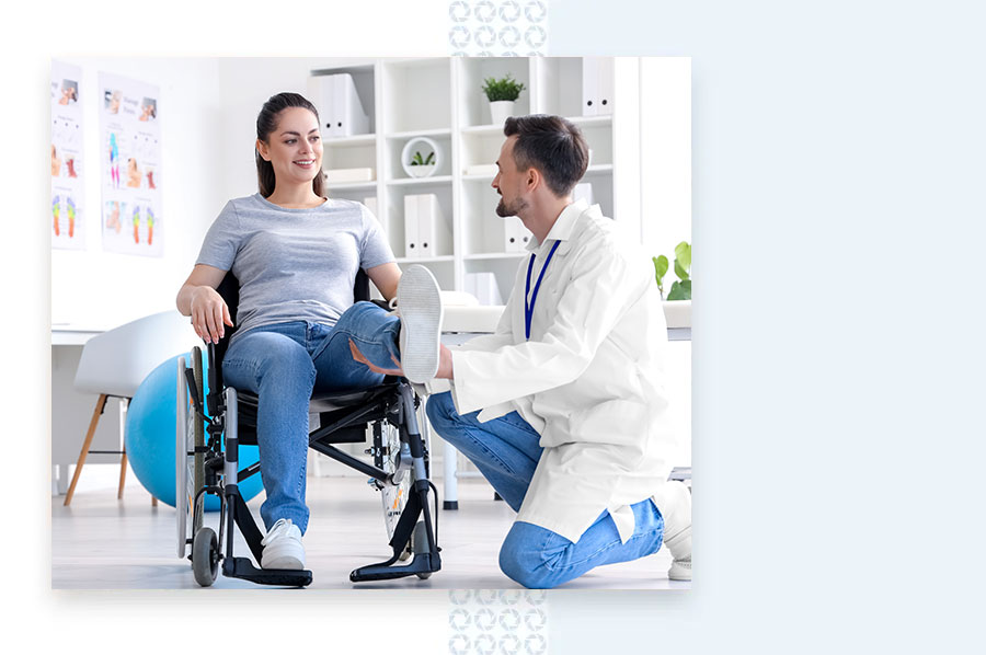 OPH_whattoExpect-LP Doctor works with woman in wheelchair on therapy