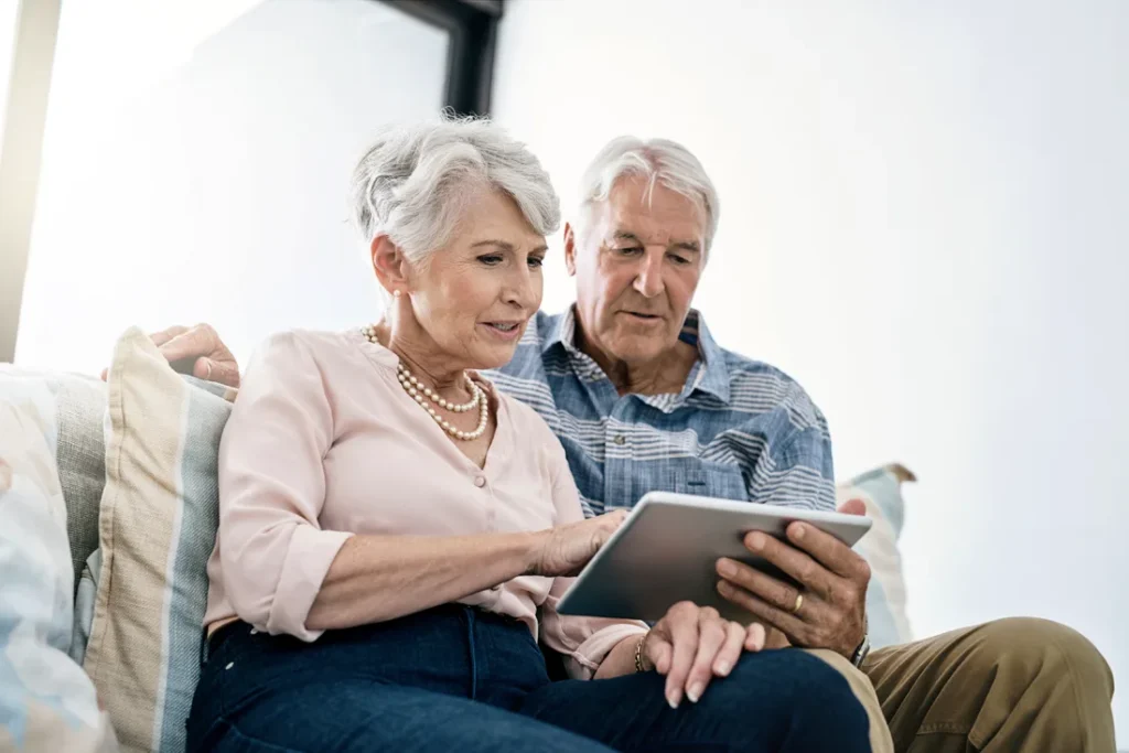 Elder couple reviews memory care information